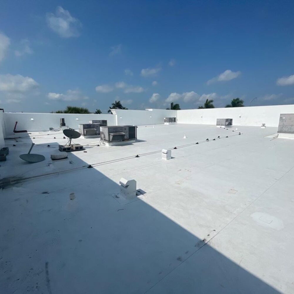 Skilled 1907 Roofing team installing energy-efficient commercial roofing, enhancing business sustainability in Oklahoma City